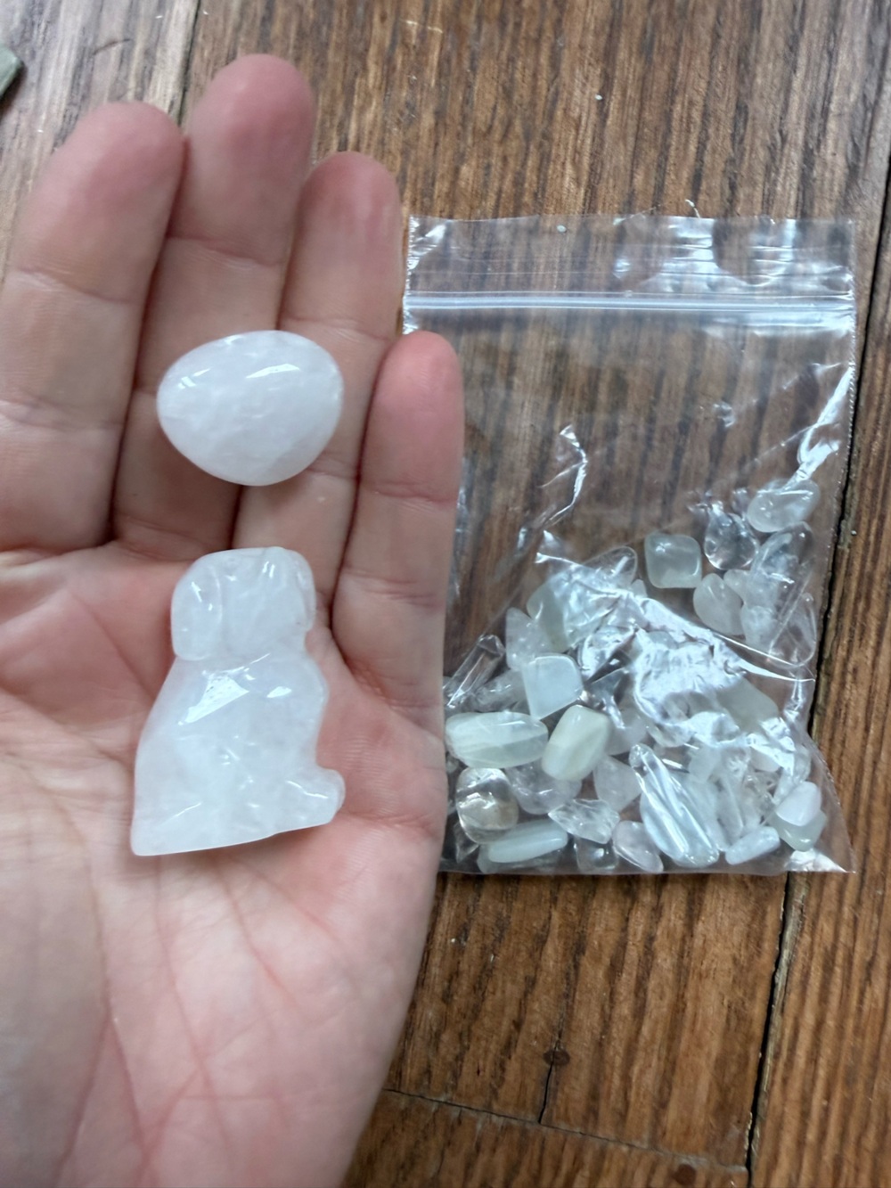 Bundle of clear quartz crystals w dog carving